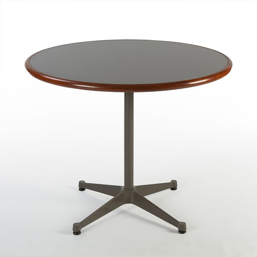 front angled view of Grey Herman Miller Original Vintage Eames Round ET108 Contract Table