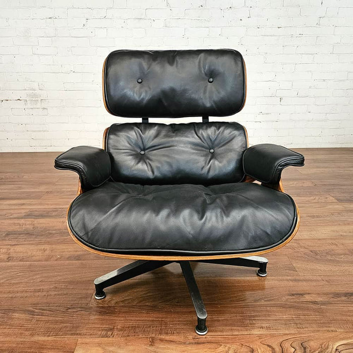 Front view of Black and Rosewood Eames Lounge Chair