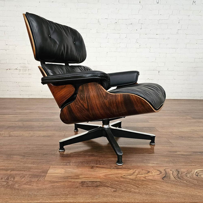 Angled view of Black and Rosewood Eames Lounge Chair