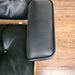 View of arm on Black and Rosewood Eames Lounge Chair