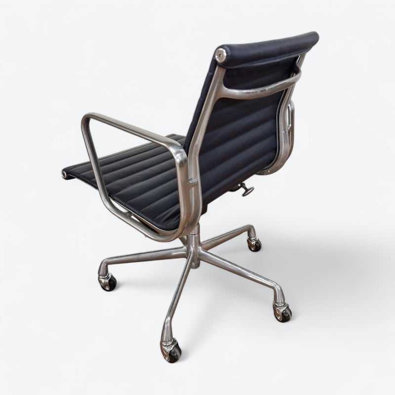 Left rear angled view of Navy Blue Eames EA335