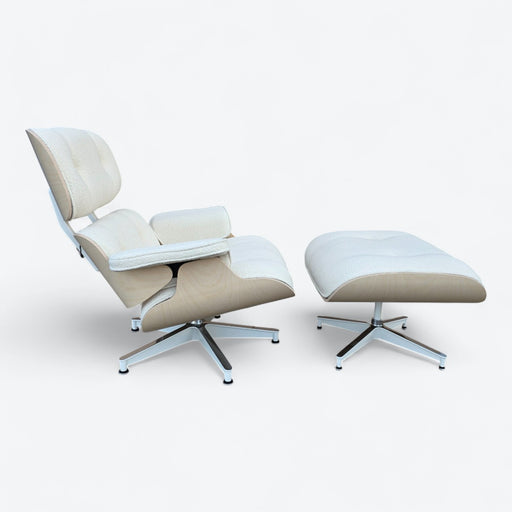 Right side view of white flamiber ash Eames Lounge Chair and ottoman
