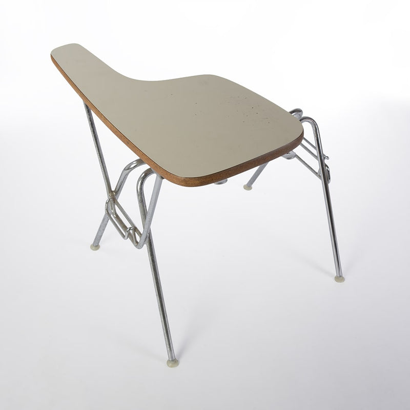 Angled top down view of Eames DSS-T table top stacking base