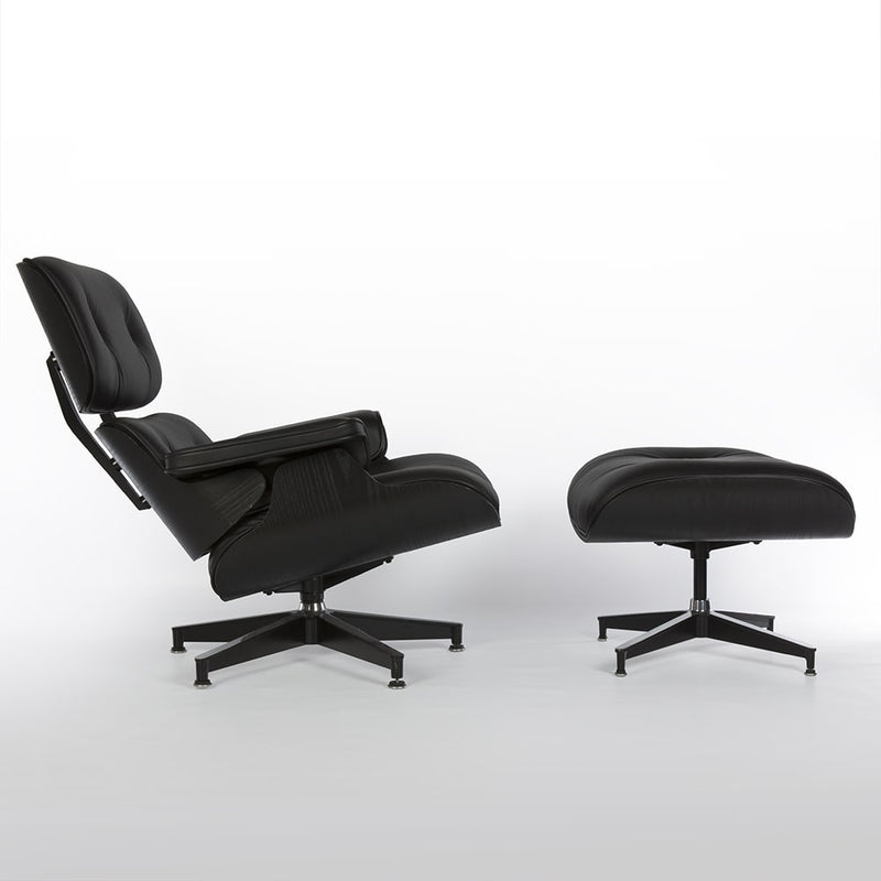 Right side view of all black Eames lounge chair and ottoman