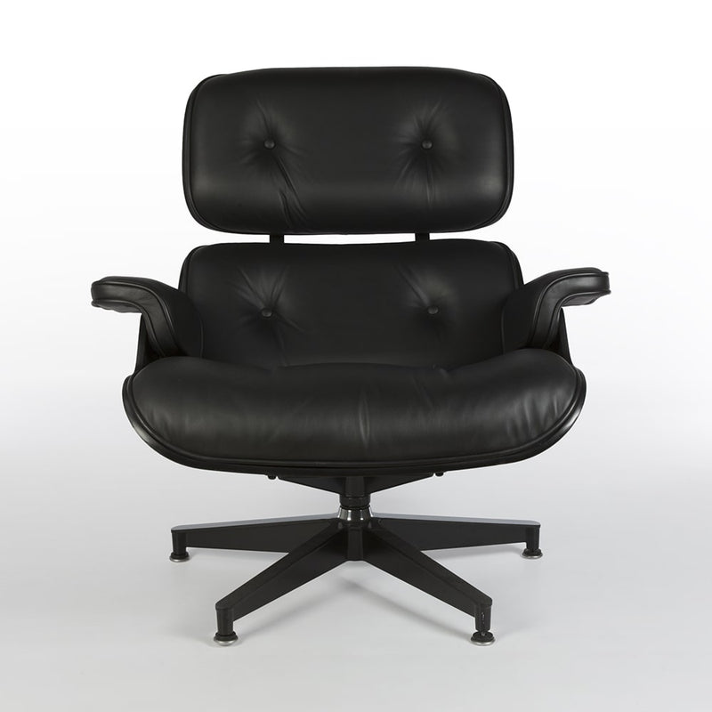 Front view of all black Eames lounge chair