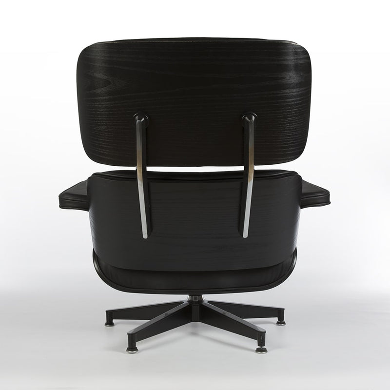 Rear view of all black Eames lounge chair