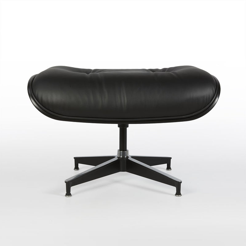 Front view of all black Eames lounge ottoman