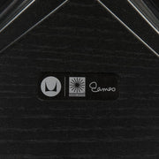 View of label on all black Eames lounge chair and ottoman
