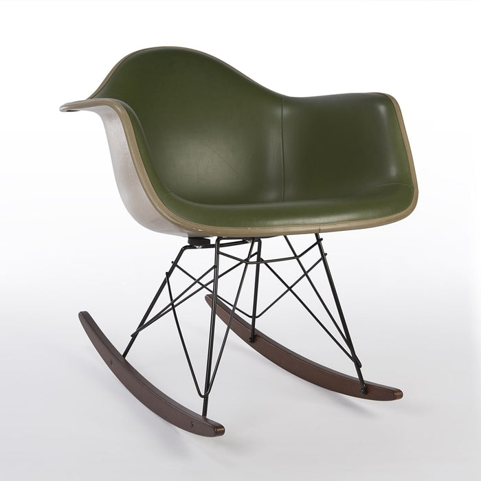 Front angled view of green on greige Eames RAR rocking arm chair