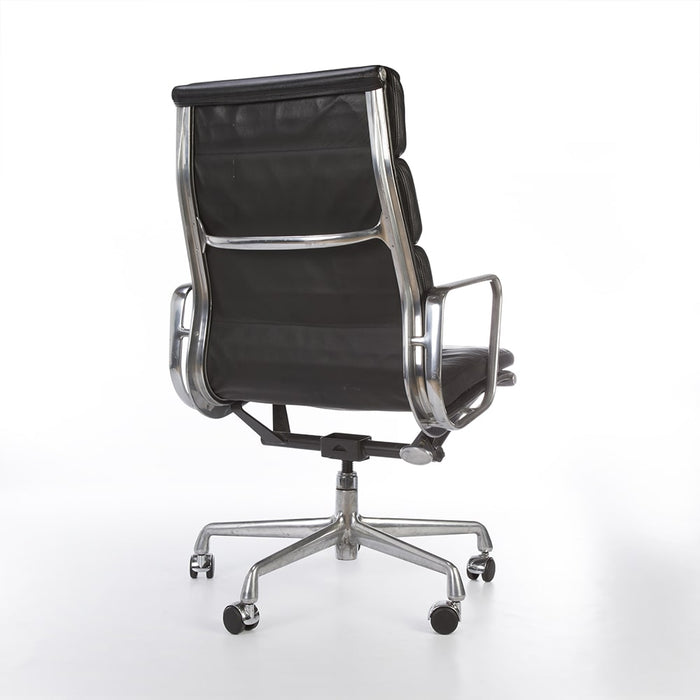 Rear angled view of black Eames EA437 office chair