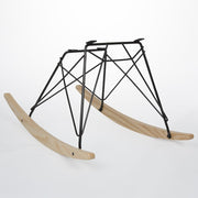 Front angled view of light ash Eames RAR rocking base