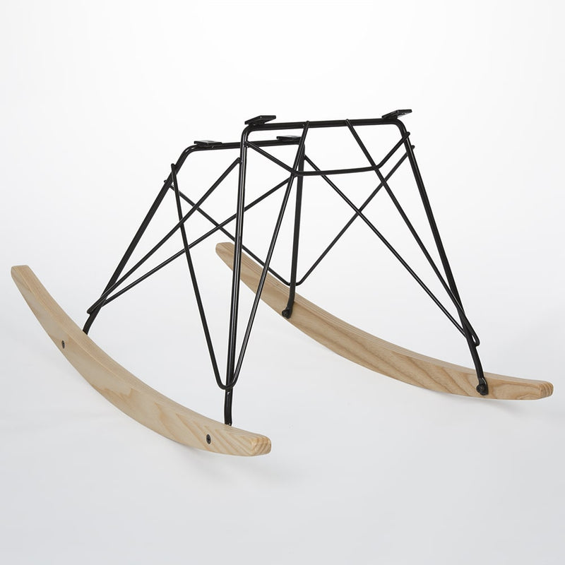 Front angled view of light ash Eames RAR rocking base