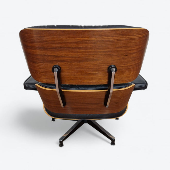 Rear view of black and walnut Eames Lounge Chair