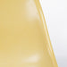 Partial front view of ochre Eames DSW