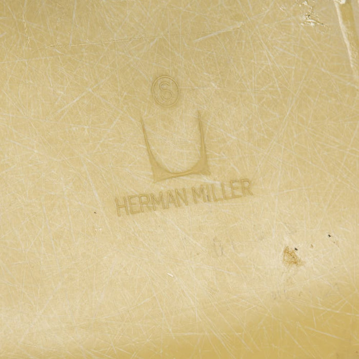 View of logo on ochre Eames DSW