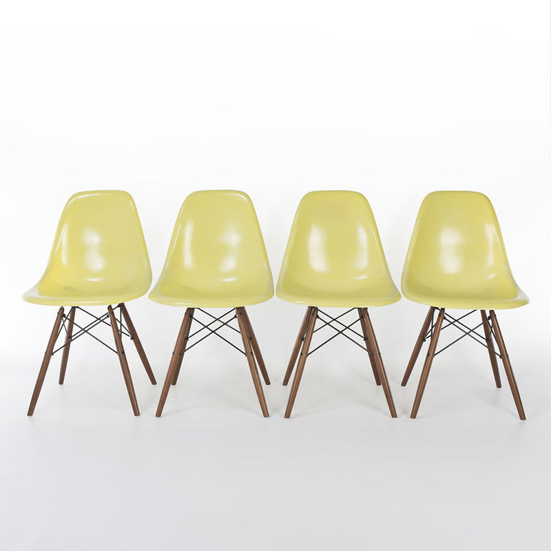 Front view of set of 4 Lemon Yellow Eames DSWs in a line