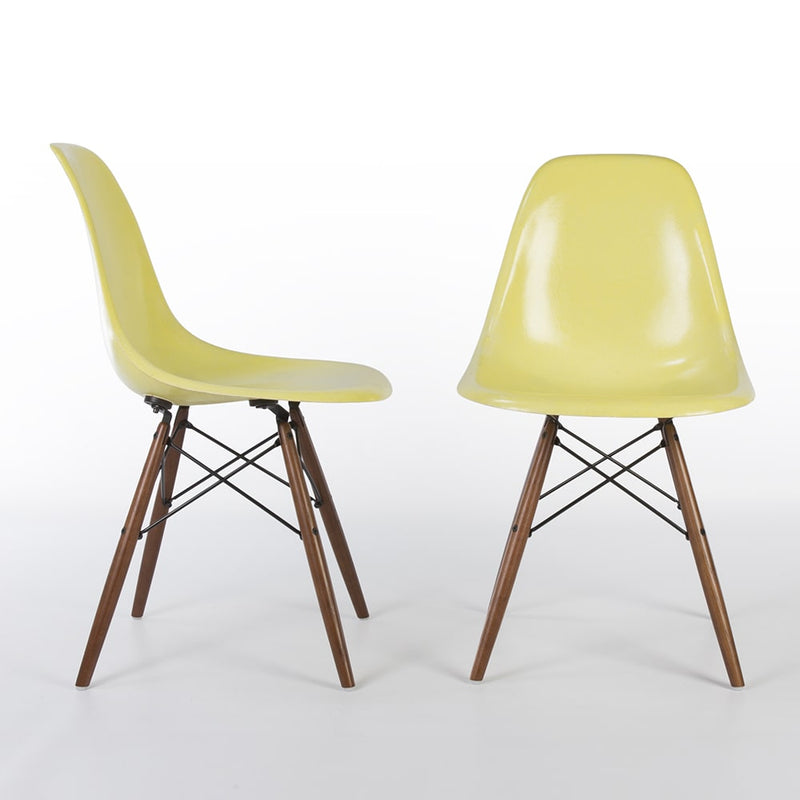 View of pair of Lemon Yellow Eames DSWs, one from front, one from right side