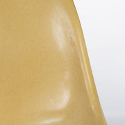 Close up partial front view of ochre Eames DSW