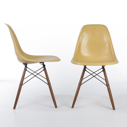 View of pair of Ochre Eames DSWs, one from right side, one from front