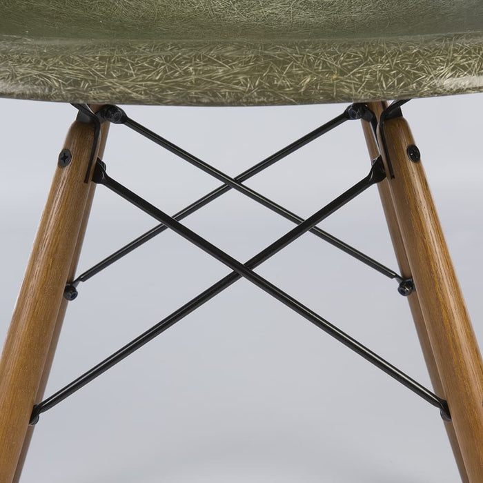 Close up view of base on Olive Green Eames DSW