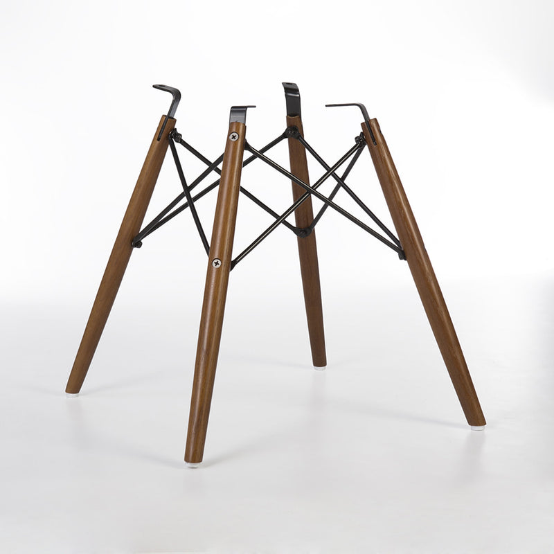 Rear angled view of light oak Eames dowel base