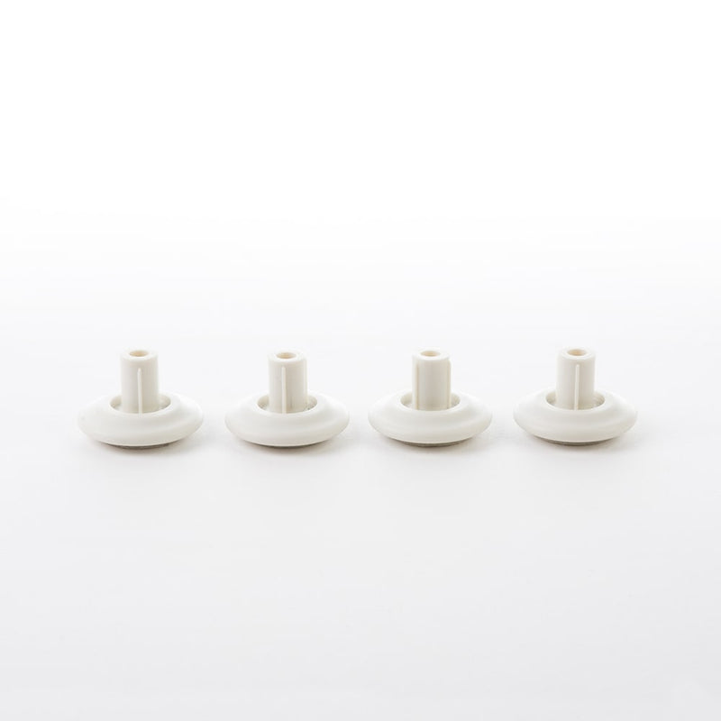 Image of full set of four white glides for Eames Office, Aluminium Lounge and Vitra Lounge Chair