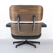 Rear view of green mohair walnut Eames Lounge Chair