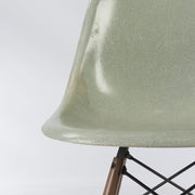 Partial front view of light seafoam Eames DSW