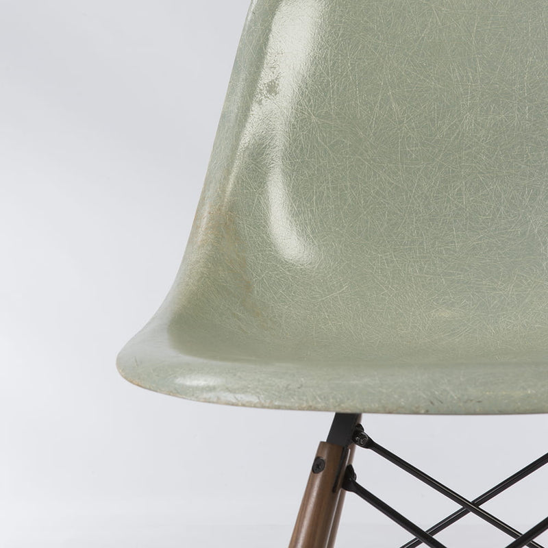Partial front view of light seafoam Eames DSW