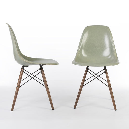 View of pair of light seafoam Eames DSWs, one from front, one from right side