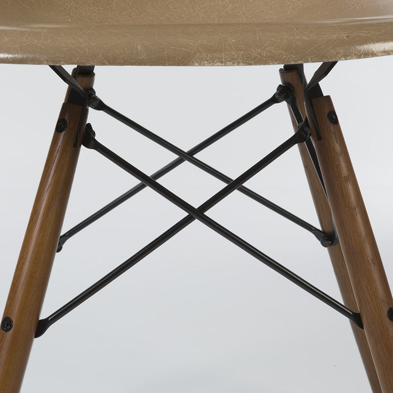 Partial view of base on tan Eames DSW