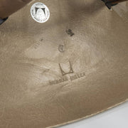 View of logo on tan Eames DSW
