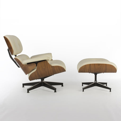 Right side view of cream and walnut Eames Lounge Chair and Ottoman