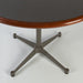 Angled top down view of base on Grey Herman Miller Original Vintage Eames Round ET108 Contract Table