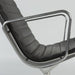 Close up right side view of black EA316 Eames Aluminium Lounge Chair