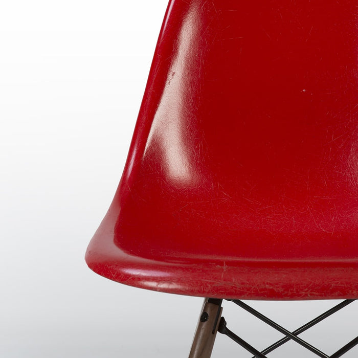 Close up partial front view of Red Eames DSW