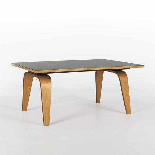 Front angled view of black Eames Evans OTW coffee table