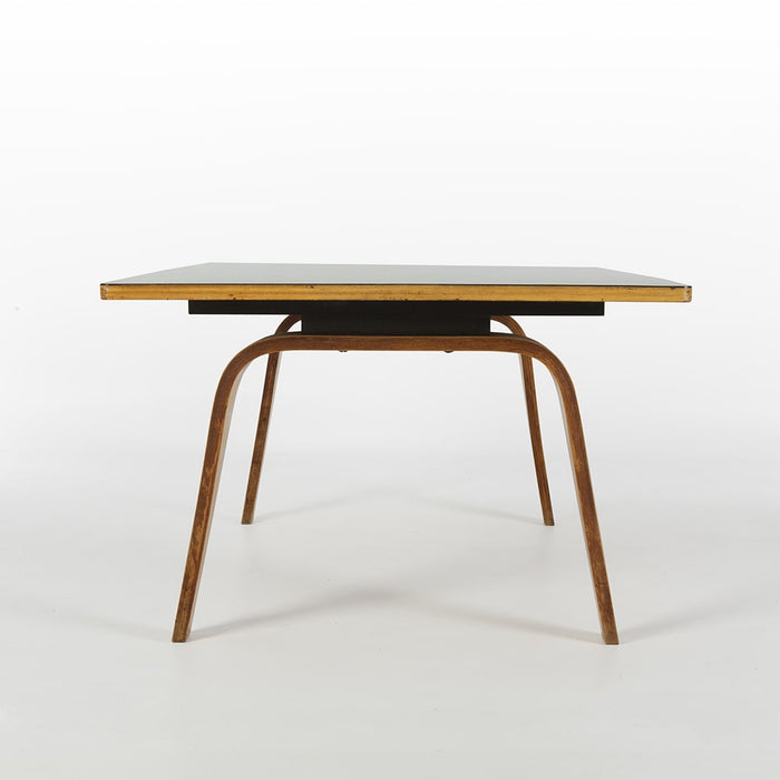 End on view of black Eames Evans OTW coffee table