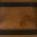 View of logo on black Eames Evans OTW coffee table
