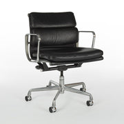 Front angled view of black Eames EA435 office chair