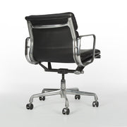 Rear angled view of black Eames EA435 office chair