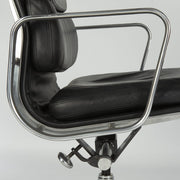 Close up right side view of black Eames EA435 office chair