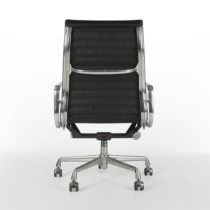 Rear view of black Eames EA337 office chair