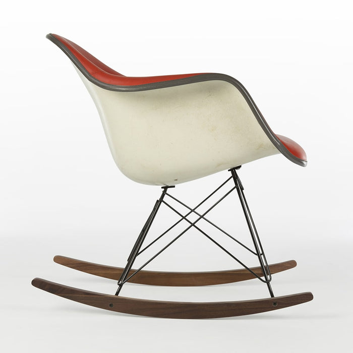 Right side view of red Eames RAR rocking arm chair