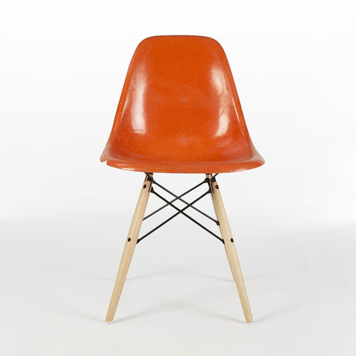 Front view of orange Eames DSW dining side chair