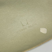 View of logo on Grey Yellow Eames DSW