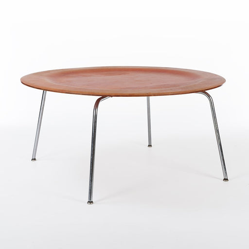 Front angled view of red Eames CTM coffee table