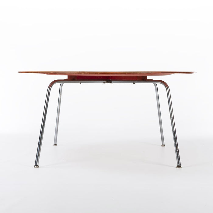 Front view of red Eames CTM coffee table