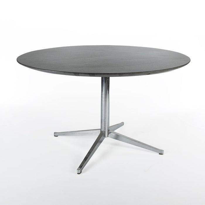 Front angled view of black granite Knoll table