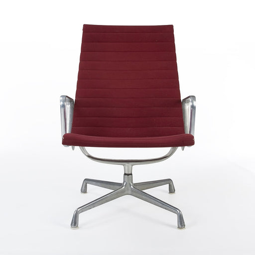 Front view of red Eames EA316 aluminium lounge chair